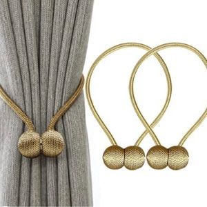Magnetic curtain tie back clips